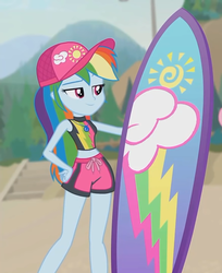 Size: 585x718 | Tagged: safe, screencap, rainbow dash, blue crushed, equestria girls, g4, my little pony equestria girls: better together, belly button, cap, clothes, cropped, female, geode of super speed, hat, legs, magical geodes, midriff, shorts, smiling, surfboard, swimsuit