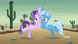 Size: 1920x1080 | Tagged: safe, screencap, starlight glimmer, trixie, pony, unicorn, g4, road to friendship, balancing, bipedal, cactus, cheek squish, cute, desert, diatrixes, discovery family logo, duo, duo female, eye contact, female, friendship chant, glimmerbetes, holding hooves, injured, looking at each other, mare, messy mane, saguaro cactus, squishy cheeks