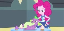 Size: 1315x640 | Tagged: safe, screencap, pinkie pie, spike, spike the regular dog, dog, equestria girls, friendship games bloopers, g4, my little pony equestria girls: friendship games, cupcake, fat, fat spike, food, gluttony, needs more jpeg, pinkie pie is not amused, puppy, raised eyebrow, stuffed, unamused