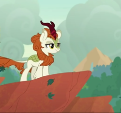 Size: 578x540 | Tagged: safe, screencap, autumn blaze, kirin, g4, sounds of silence, cliff, cropped, female, smiling, solo