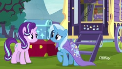 Size: 1920x1080 | Tagged: safe, screencap, starlight glimmer, trixie, pony, unicorn, g4, road to friendship, cape, clothes, eye contact, female, looking at each other, mare, smiling, trixie's cape, trixie's wagon