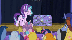 Size: 1912x1068 | Tagged: safe, screencap, berry punch, berryshine, blues, bon bon, caramel, carrot top, cherry berry, daisy, flower wishes, golden harvest, goldengrape, granny smith, hoo'far, linky, lucky clover, noteworthy, princess cadance, princess flurry heart, royal riff, shoeshine, sir colton vines iii, starlight glimmer, sweetie drops, trixie, twilight sparkle, alicorn, earth pony, pony, saddle arabian, unicorn, road to friendship, acting, animated, baby, baby pony, bandicam, chains, chest, crowd, female, magic, magic show, magic trick, male, mare, scared, sound, stage, stallion, trunk, twilight sparkle (alicorn), watch, webm, www.bandicam.com