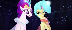 Size: 1920x804 | Tagged: safe, screencap, princess skystar, queen novo, seapony (g4), g4, my little pony: the movie, blue eyes, blue mane, bubble, collar, crown, cute, excited, eyelashes, eyeshadow, faic, female, fin wings, fins, flower, flower in hair, freckles, glowing, grin, happy, jewelry, like mother like daughter, like parent like child, looking at each other, makeup, mother and daughter, necklace, ocean, open mouth, pearl necklace, regalia, seaquestria, seashell necklace, shell, smiling, teeth, underwater, water, wings