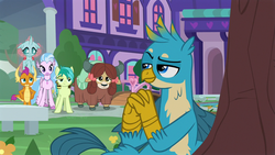 Size: 1280x720 | Tagged: safe, screencap, gallus, ocellus, sandbar, silverstream, smolder, yona, changedling, changeling, dragon, griffon, hippogriff, pony, yak, g4, what lies beneath, holding hands, monkey swings, raised eyebrow, sandbar is not amused, school of friendship, smolder is not amused, student six, teasing, tree