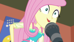 Size: 1280x720 | Tagged: safe, screencap, fluttershy, equestria girls, fluttershy's butterflies, fluttershy's butterflies: rainbow dash, g4, my little pony equestria girls: better together, announcer, excited, female, football, geode of fauna, magical geodes, microphone, smiling, solo, sports, wide eyes