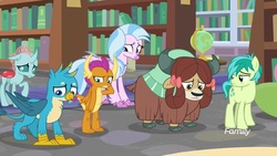 Size: 1920x1080 | Tagged: safe, screencap, gallus, ocellus, sandbar, silverstream, smolder, yona, changedling, changeling, classical hippogriff, dragon, earth pony, griffon, hippogriff, pony, yak, g4, what lies beneath, bookshelf, bow, cloven hooves, discovery family, discovery family logo, dragoness, female, globe, hair bow, jewelry, library, logo, male, monkey swings, necklace, sad, student six, teenager