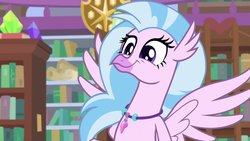 Size: 1280x720 | Tagged: safe, screencap, silverstream, hippogriff, g4, what lies beneath, bookshelf, cute, diastreamies, faic, female, jewelry, library, necklace, solo, spread wings, wings