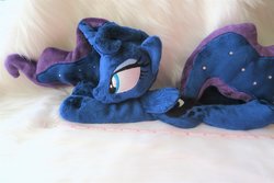 Size: 1024x683 | Tagged: safe, artist:kazzysart, princess luna, alicorn, pony, g4, beanie (plushie), female, folded wings, horn, irl, mare, missing accessory, photo, plushie, prone, solo, wings