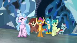 Size: 1280x720 | Tagged: safe, screencap, gallus, ocellus, sandbar, silverstream, smolder, yona, changedling, changeling, classical hippogriff, dragon, earth pony, griffon, hippogriff, pony, yak, g4, what lies beneath, bow, cloven hooves, dragoness, female, hair bow, jewelry, male, monkey swings, necklace, student six, teenager