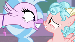 Size: 1280x720 | Tagged: safe, screencap, cozy glow, silverstream, classical hippogriff, hippogriff, pegasus, pony, g4, what lies beneath, boop, eye contact, female, filly, grin, jewelry, looking at each other, necklace, nervous, nose wrinkle, noseboop, raised hoof, smiling, spread wings, squee, wings