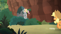 Size: 1920x1080 | Tagged: safe, screencap, applejack, fluttershy, earth pony, pegasus, pony, g4, sounds of silence, cliff, discovery family logo, eyes closed, female, flying, gritted teeth, mare, moss, pushing, rock, tree