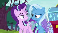 Size: 1280x720 | Tagged: safe, screencap, starlight glimmer, trixie, pony, unicorn, g4, road to friendship, brooch, cape, clothes, duo, eye contact, female, jewelry, lidded eyes, looking at each other, mare, shipping fuel, tree, trixie's brooch, trixie's cape
