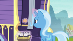 Size: 1280x720 | Tagged: safe, screencap, trixie, pony, unicorn, g4, road to friendship, butt, female, magic, magic aura, mare, narrowed eyes, plot, solo, telekinesis, trixie's wagon