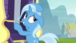 Size: 1280x720 | Tagged: safe, screencap, trixie, pony, unicorn, g4, road to friendship, bipedal, bipedal leaning, female, floppy ears, leaning, looking back, mare, smiling, solo, trixie's wagon