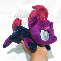 Size: 1024x1024 | Tagged: safe, artist:appledew, tempest shadow, pony, unicorn, g4, armor, beanie (plushie), broken horn, eye scar, female, hand, horn, irl, mare, photo, plushie, prone, scar, solo