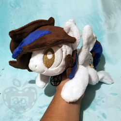 Size: 1000x1000 | Tagged: safe, artist:appledew, oc, oc only, oc:rose bell, pegasus, pony, beanie (plushie), female, hand, irl, jewelry, mare, necklace, photo, plushie, prone, solo, wings