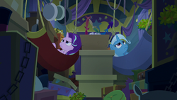 Size: 1280x720 | Tagged: safe, screencap, starlight glimmer, trixie, pony, unicorn, g4, road to friendship, clutter, duo, female, frying pan, hammock, luggage, mare, trixie's wagon
