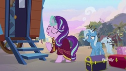 Size: 1920x1080 | Tagged: safe, screencap, starlight glimmer, trixie, pony, unicorn, g4, road to friendship, clothes, discovery family logo, duo, female, glowing horn, hoo'far's wagon, horn, magic, mare, robe