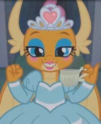 Size: 763x929 | Tagged: safe, screencap, smolder, dragon, g4, what lies beneath, claws, clothes, cropped, crown, cup, dragon wings, dragoness, dress, fangs, female, horns, jewelry, looking at you, makeup, princess smolder, regalia, smiling, solo, teacup, teeth, wings