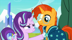 Size: 1024x576 | Tagged: safe, screencap, starlight glimmer, sunburst, g4, the crystalling, clothes, female, glasses, lidded eyes, male, mare, robe, stallion, sunburst's cloak, sunburst's glasses