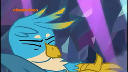 Size: 1280x720 | Tagged: safe, screencap, gallus, griffon, g4, what lies beneath, eyes closed, male, nickelodeon, sneezing, wings