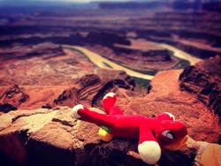 Size: 1080x810 | Tagged: safe, photographer:peter new, big macintosh, earth pony, pony, g4, canyon, dead horse, grand canyon, irl, lying, male, on back, photo, playing dead, plushie, smiling, solo, stallion, sunbathing, united states, wordplay