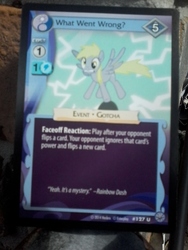 Size: 640x480 | Tagged: safe, derpy hooves, g4, blurry, merchandise, text, trading card game
