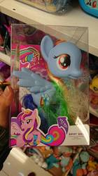 Size: 575x1024 | Tagged: safe, fluttershy, princess cadance, rainbow dash, alicorn, pegasus, pony, g4, bootleg, element of magic, fake, female, hand, irl, mare, photo, red eyes, styling size, sweet baby, toy, try me, wat