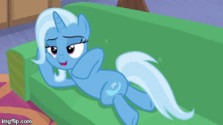 Size: 360x202 | Tagged: safe, screencap, trixie, pony, unicorn, g4, road to friendship, season 8, animated, couch, draw me like one of your french girls, female, looking back, lying down, mare, prone, solo, sploot, talking