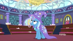 Size: 1920x1080 | Tagged: safe, screencap, trixie, pony, unicorn, a matter of principals, g4, banana, bananaphone, cape, clothes, discovery family logo, female, food, glowing horn, hat, horn, magic, mare, solo, trixie's cape, trixie's hat