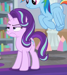 Size: 618x700 | Tagged: safe, screencap, rainbow dash, starlight glimmer, pegasus, pony, unicorn, g4, school raze, annoyed, cropped, female, flying, horn, mare, solo focus, standing, starlight glimmer is not amused, unamused, wings