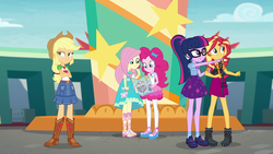 Size: 1920x1080 | Tagged: safe, screencap, applejack, fluttershy, pinkie pie, sci-twi, sunset shimmer, twilight sparkle, equestria girls, equestria girls specials, g4, my little pony equestria girls: better together, my little pony equestria girls: rollercoaster of friendship, boots, clothes, cowboy hat, crossed arms, denim skirt, dress, equestria land, female, geode of empathy, geode of fauna, geode of sugar bombs, geode of super strength, geode of telekinesis, glasses, hat, high heel boots, jacket, leather, leather jacket, pantyhose, ponytail, sandals, shoes, skirt, smiling, socks