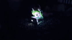 Size: 656x368 | Tagged: safe, artist:minty root, artist:qtpony, oc, oc only, oc:minty root, pony, unicorn, animated, bed, bow, computer, female, gif, headphones, irl, laptop computer, live action, lying on bed, macbook, mare, photo, plushie, puppet, typing