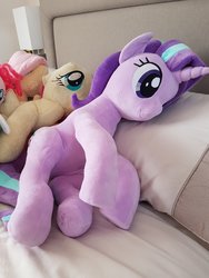 Size: 900x1200 | Tagged: safe, artist:nekokevin, fluttershy, pinkie pie, starlight glimmer, pony, unicorn, series:nekokevin's glimmy, g4, bed, female, irl, lying down, mare, photo, pillow, plushie, size difference, smiling, underhoof