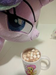 Size: 510x680 | Tagged: photographer needed, safe, artist:bugplayer, fluttershy, starlight glimmer, pony, unicorn, g4, chocolate, cup, devious, empathy cocoa, evil planning in progress, female, food, hot chocolate, hot coco, irl, mare, marshmallow, mug, photo, plushie, pure unfiltered evil, smiling, smug, smuglight glimmer, solo