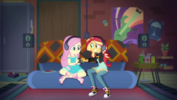 Size: 1920x1080 | Tagged: safe, screencap, fluttershy, sunset shimmer, equestria girls, g4, game stream, my little pony equestria girls: better together, clothes, controller, converse, couch, cute, feet, female, gamer sunset, gamershy, headphones, poster, sandals, shoes, shyabetes, sneakers, sunset's apartment, video game