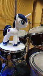 Size: 1151x2048 | Tagged: safe, artist:dixierarity, shining armor, pony, unicorn, g4, cutie mark, drum kit, drums, irl, male, musical instrument, photo, plushie, prince, unshorn fetlocks