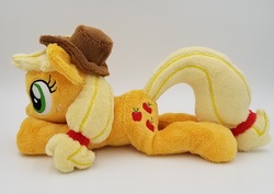 Size: 710x503 | Tagged: safe, artist:lunarchik13, applejack, earth pony, pony, g4, applejack's hat, beanie (plushie), cowboy hat, female, hat, irl, mare, photo, plushie, prone, solo