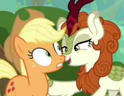 Size: 1390x1080 | Tagged: safe, screencap, applejack, autumn blaze, kirin, pony, g4, sounds of silence, applejack's hat, cowboy hat, curved horn, duo, female, freckles, hat, horn, looking at each other, mare, out of context, scales, wide eyes