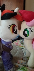 Size: 4032x1960 | Tagged: safe, roseluck, oc, oc:blackjack, earth pony, pony, unicorn, fallout equestria, fallout equestria: project horizons, g4, boop, female, irl, mare, noseboop, now kiss, photo, plushie, yellow eyes