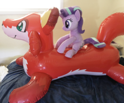 Size: 3651x3024 | Tagged: safe, starlight glimmer, fox, pony, unicorn, g4, high res, inflatable, inflatable fox, inflatable toy, inflatable world, irl, photo, pool toy, riding, sitting
