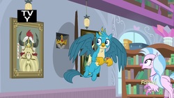 Size: 1920x1080 | Tagged: safe, screencap, gallus, silverstream, yickslur, classical hippogriff, griffon, hippogriff, a matter of principals, g4, bookshelf, bust, crown, crown of grover, duo, female, helm of yickslur, helmet, jewelry, library, male, portrait, regalia, tv rating, tv-y