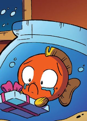 Size: 320x444 | Tagged: safe, idw, puddles (g4), fish, g4, spoiler:comicholiday2015, crying, fish bowl, present, sad