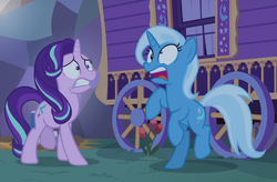 Size: 742x488 | Tagged: safe, screencap, starlight glimmer, trixie, pony, unicorn, g4, to where and back again, duo, female, mare, open mouth, rearing, trixie's wagon