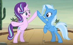 Size: 628x384 | Tagged: safe, screencap, starlight glimmer, trixie, pony, unicorn, g4, road to friendship, bipedal, duo, female, looking at each other, mare, open mouth, underhoof