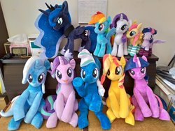 Size: 2048x1536 | Tagged: safe, artist:nekokevin, princess luna, rainbow dash, rarity, starlight glimmer, sunset shimmer, trixie, twilight sparkle, oc, oc:golden gates, oc:quillpen, alicorn, earth pony, pegasus, pony, unicorn, series:nekokevin's glimmy, g4, 4de, bedroom eyes, clothes, cute, female, group, group photo, hoof shoes, irl, jewelry, looking at you, mare, open mouth, peytral, photo, plushie, raised hoof, regalia, sitting, smiling, socks, spread wings, starlight's little twibird, striped socks, twilight sparkle (alicorn), wings