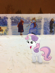 Size: 2448x3264 | Tagged: safe, artist:albertuha, sweetie belle, pony, unicorn, g4, female, high res, irl, mare, night, photo, ponies in real life, raised hoof, smiling, snow, solo, winter