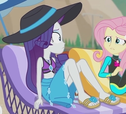 Size: 872x787 | Tagged: safe, screencap, fluttershy, rarity, aww... baby turtles, equestria girls, g4, my little pony equestria girls: better together, beach chair, belly button, bikini, bikini top, chair, clothes, female, flip-flops, fluttershy's wetsuit, hat, rarity's blue sarong, rarity's purple bikini, sandals, sarong, sun hat, swimsuit, wetsuit