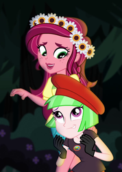 Size: 733x1027 | Tagged: safe, screencap, drama letter, gloriosa daisy, watermelody, equestria girls, g4, my little pony equestria girls: legend of everfree, background human, beret, camp everfree logo, camp everfree outfits, cropped, duo, duo female, female, flower, flower in hair, hat, smiling