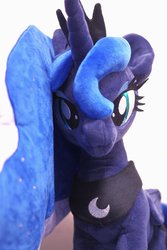 Size: 1365x2048 | Tagged: safe, artist:nekokevin, princess luna, alicorn, pony, g4, :3, female, irl, jewelry, looking at you, mare, peytral, photo, plushie, regalia, smiling, solo